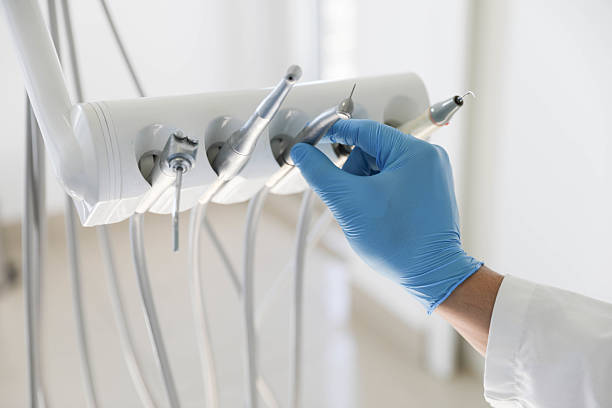 Professional Invisalign Clear Aligners technician working in Firthcliffe, NY